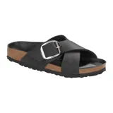 Sandalias Birkenstock modelo Siena Big Buckle, color negro, con diseño de tiras cruzadas y hebilla metálica grande. Presentan plantilla anatómica de corcho y suela de goma.