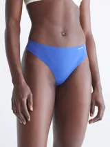 Colaless azul de microfibra suave con bordes cortados a láser y logo de Calvin Klein estampado en la cadera.