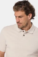 Remera polo de piqué, color azul, de manga corta con cuello en Rib y botones personalizados.