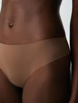 Pack de tres bombachas clásicas de microfibra en color negro, beige y marrón claro.