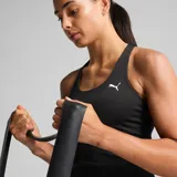 Musculosa deportiva Puma modelo TAD Essentials 2 En 1, color negro con espalda tipo nadadora y el logo de la marca estampado en blanco en el pecho.