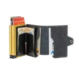 Billetera de cuero negra con detalles dorados, marca Baleine, modelo Double Kansas.