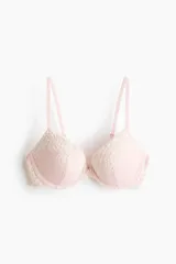 Soutien push-up rosado de encaje y malla, con aros, breteles ajustables y copas acolchadas.