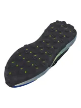 Championes Under Armour Fat Tire Venture Pro, diseñados para terrenos difíciles. Presentan una parte superior de tejido ripstop negro con refuerzos de gamuza en azul y detalles en verde neón. Cuentan con amortiguación reactiva UA HOVR y una suela de caucho con tacos de tracción profunda para un agarre superior.