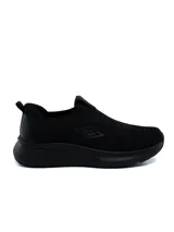Championes deportivos Umbro modelo Magna para hombre, tipo slip-on sin cordones, confeccionados en tejido knit azul marino con suela gruesa de goma blanca.