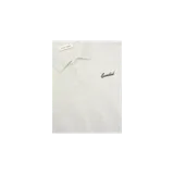 Remera polo de punto de Fear of God Essentials, color gris claro, de manga tres cuartos y corte oversize estilo años 90. Presenta cuello camisero con cierre frontal de un botón y el logo bordado en el pecho.
