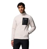 Campera de polar tipo sherpa en color beige, con cierre frontal completo y cuello alto. Presenta un bolsillo frontal en el pecho con cierre y revestimiento en contraste negro, además de bolsillos laterales. Incluye el logo de la marca en el bolsillo del pecho.