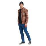 Camisa de manga larga a cuadros color ocre, azul y negro, con bolsillo en el pecho y logo de la marca.