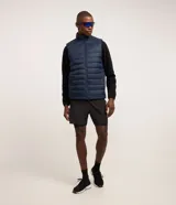 Chaleco puffer deportivo Get Over para hombre, de color negro con cuello alto, diseño acolchado de gajos y cierre frontal con cremallera.
