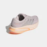 Championes de running Adidas Response 2, con exterior de malla transpirable en tono lila y detalles en naranja y plateado. Presentan mediasuela Cloudfoam+ para mayor amortiguación y suela de caucho para mayor tracción.