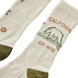 Medias blancas con detalles alusivos a California: oso, estrella roja, texto "California" y "Est. 1850".