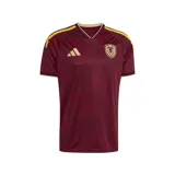 Camiseta de fútbol Adidas de la selección de Venezuela, modelo de primera equipación 2026. Diseño color vino tinto con patrón geométrico en el frente, detalles en amarillo en hombros y cuello, logo de Adidas y escudo de la federación venezolana en el pecho.