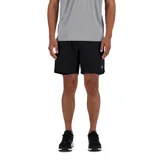 Short deportivo negro de New Balance, modelo 7 Inch Lined, para hombre. Confeccionado en poliéster reciclado y poliéster, con tecnología NB DRY de secado rápido, forro interior sin costuras, cordones internos, bolsillos laterales y bolsillo trasero con cierre.
