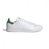 Championes Adidas Stan Smith unisex, color blanco con detalles en verde en el talón y la lengüeta. Confeccionados con materiales reciclados y veganos.