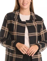 Cardigan largo de tejido de punto con estampado de cuadros, cuello con solapa y abertura frontal. Confeccionado en una mezcla de poliéster y viscosa.