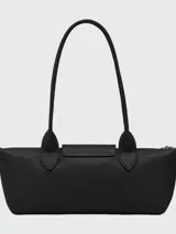 Cartera de hombro Longchamp modelo Le Pliage Xtra en tamaño pequeño, confeccionada en cuero con diseño minimalista, cierre de solapa con botón a presión y doble asa fija.