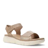 Sandalias de cuero color beige con plataforma baja de goma blanca. Presentan tiras anchas con detalles perforados y un toque de brillo dorado en la parte frontal, con cierre de velcro ajustable en el tobillo.