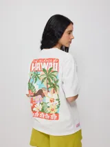 Remera amarilla de algodón con corte oversized y estampado en el frente.