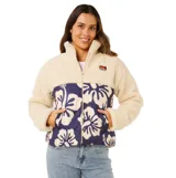 Campera tipo puffer de Rip Curl, con diseño combinado de corderito color beige en la parte superior y mangas, y panel frontal acolchado en color azul marino con estampado floral. Cuenta con cierre frontal completo y cuello alto.