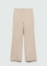 Pantalón wide leg de tejido de punto color beige, con cintura elástica y diseño largo.
