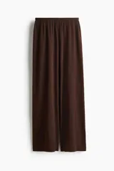 Pantalón de yoga de punto suave en mezcla de modal, de corte relajado, con cintura elástica de tiro bajo y piernas amplias.