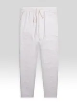 Pantalón blanco de algodón con textura, cintura elastizada y cordón ajustable.