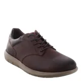 Zapatos casuales Freeway modelo Oslo, confeccionados en nobuk color marrón miel. Presentan cierre con cordones, cuello acolchado en tono oscuro y suela de goma flexible en color beige.