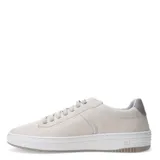 Zapatos acordonados de cuero color marrón claro, con suela blanca y detalle de marca en el lateral.