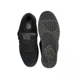 Championes Vans modelo Hylane, color negro, con diseño de perfil bajo, confeccionados en gamuza y materiales sintéticos, con la icónica banda lateral Sidestripe y suela de goma resistente.