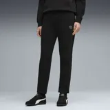 Pantalón de jogging Puma color negro, de corte recto y ajuste cómodo. Presenta el logo de la marca bordado en la parte superior del muslo y puños elásticos en los tobillos.