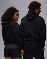 Buzo hoodie negro de la marca Nike Jordan, con logo Jumpman bordado en blanco en el pecho y bolsillo tipo canguro.