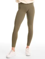 Legging de tiro alto confeccionada en algodón elástico con cintura ancha modeladora. Presenta un calce ajustado y tejido opaco de tacto natural.