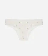 Bombacha tipo bikini confeccionada en microfibra color crema con estampado de cerezas pequeñas y detalles de encaje en los bordes. Cuenta con forro de algodón.
