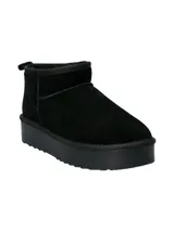 Bota corta de estilo casual, confeccionada en cuero negro con interior forrado en poliéster. Presenta una suela de plataforma de goma negra y un diseño minimalista de caña baja.