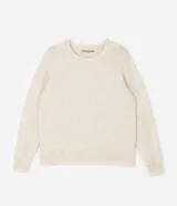 Suéter de punto color beige con cuello redondo, manga larga y aplicaciones de perlas distribuidas por toda la prenda. Presenta puños y ruedo acanalados.