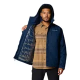 Campera impermeable y transpirable con tecnología Omni-Tech y forro termorreflectante Omni-Heat. Cuenta con capucha ajustable, cierre frontal con solapa protectora, bolsillos con cremallera en el pecho y laterales, y puños ajustables.