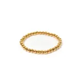 Pulsera elástica dorada con cuentas redondas de acero enchapado en oro.