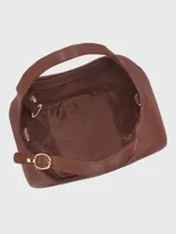 Cartera de mano tamaño pequeño Longchamp de la línea Le Foulonné, confeccionada en cuero negro con diseño estructurado de forma semicircular, asa superior y correa ajustable.