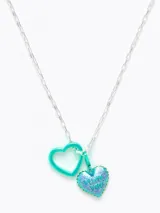 Aros colgantes con forma de corazón, uno turquesa liso y otro turquesa brillante con la inscripción 'I love you'.