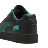 Championes Puma modelo Caven III, edición especial Aston Martin Formula One Team. Diseño en color negro con detalles en verde, confeccionados en cuero sintético con perforaciones en la puntera y suela de goma resistente.