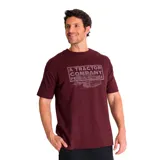 Remera de algodón color bordó con cuello redondo y mangas cortas. Presenta un estampado gráfico en el pecho con la leyenda 'A TRACTOR COMPANY PEORIA IL USA' y la ilustración de un tractor.