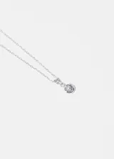 Cadena de plata 925 con dije de punto de luz engarzado con zirconia.