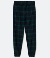 Pantalón de pijama de franela con estampa cuadrillé en tonos azul y verde. Tiene puños elásticos en los tobillos y cordón ajustable en la cintura.