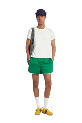 Bolso tipo shopper de la colección Benito Antonio x Zara, confeccionado en tejido con estampado a cuadros en tonos marrones y blancos. Cuenta con compartimento principal sin cierre, doble asa de mano y un pequeño bordado distintivo en la parte inferior.