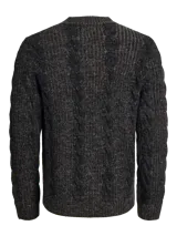 Sweater de punto con manga larga, cuello redondo y fit relajado. Presenta un diseño de tejido con textura acanalada y trenzada, puños y ruedo acanalados.