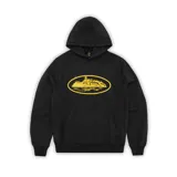 Hoodie negro de algodón con capucha y bolsillo canguro. Estampado amarillo en el pecho con la imagen de la prisión de Alcatraz dentro de un óvalo.