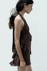 Coletero maxi de gasa color fucsia con volados y borde rosa claro.