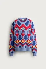 Jersey de punto tejido en hilatura de algodón, con diseño de patrones geométricos en colores celeste, azul, rojo y amarillo. Presenta cuello redondo, manga larga y acabados en rib.
