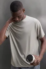 Remera de entrenamiento regular fit de Zara Athleticz, confeccionada en tejido técnico verde melange con estructura, ligero y elástico. Cuenta con tecnología Quick Dry nivel 2, cuello redondo, manga corta, costuras planas y detalle de logo estampado.