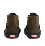 Championes de caña alta Vans modelo BMX Sk8-Hi, con diseño en color marrón y negro. Presentan paneles laterales de lona, refuerzos de gamuza en la puntera y el talón, la icónica banda lateral Sidestripe en negro y suela de goma vulcanizada negra.